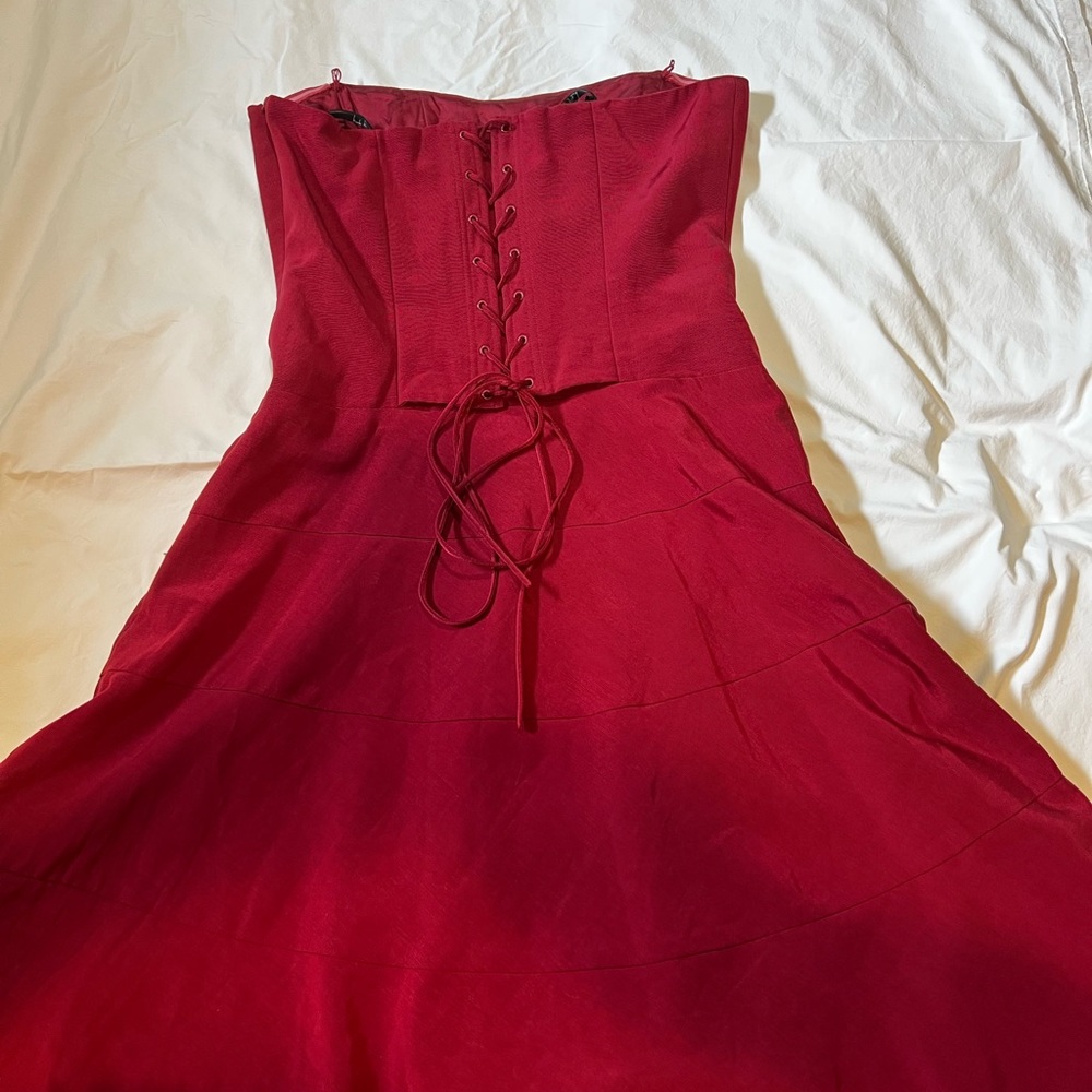 Nicole Miller collection fit and flare strapless red dress